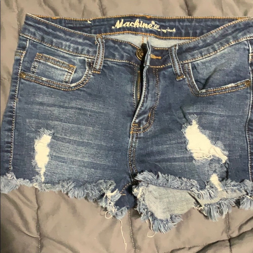 Low rise distressed denim shorts